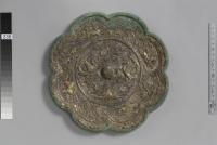 貼銀鍍金双鳳走獣紋八花鏡(ちょうぎんときんそうほうそうじゅうもんはっかきょう)（唐時代）